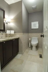 Light floor dark walls in the bathroom photo