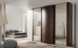 Facades of sliding wardrobes in the living room photo