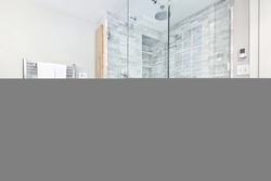 Glass shower in the bathroom photo