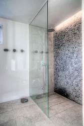 Glass shower in the bathroom photo