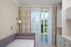 Bedroom With Balcony Door Photo