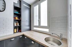 Kitchen sink against the wall photo