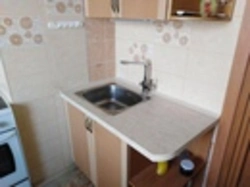 Kitchen sink against the wall photo