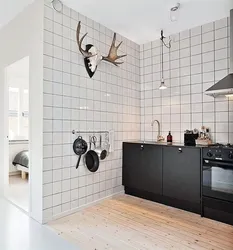 White tiles on the kitchen wall photo