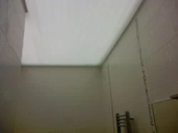 Light suspended ceilings in the bathroom photo