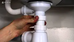 Siphon installation in the kitchen photo