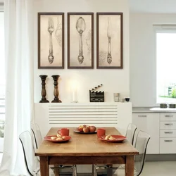 Placement of photos on the kitchen wall