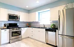 Bright kitchens with built-in appliances photo