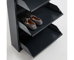 Metal shoe racks in the hallway photo