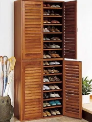 Wooden shoe racks in the hallway photo