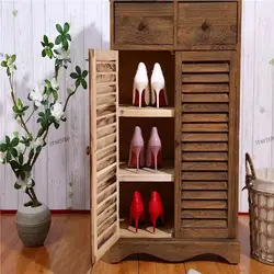 Wooden shoe racks in the hallway photo