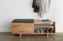 Wooden shoe racks in the hallway photo