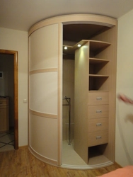 Corner wardrobe in the hallway with a mirror small size photo