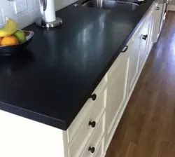 Black countertop black kitchen photo