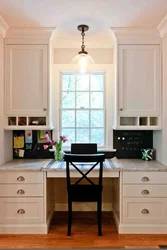 Kitchen design with a table by the window