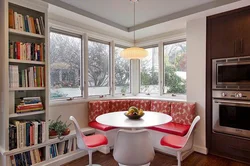 Kitchen design with a table by the window