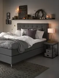Shelves above the bed in the bedroom photo