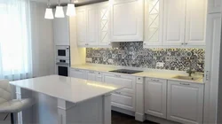 Kitchen with white countertop and apron in the interior