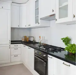 Kitchen with white countertop and apron in the interior