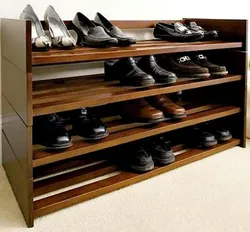 Shoe shelves in the hallway made of wood, photos of your own