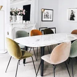 Colored chairs in the kitchen interior