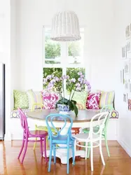 Colored chairs in the kitchen interior