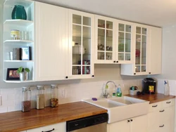 Wall cabinets for the kitchen with glass in the interior