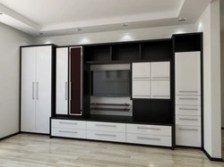 Living room wall with chest of drawers and wardrobe photo