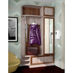 Hallway closet with mirror and hanger photo