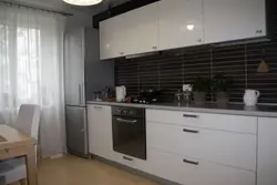 Kitchens in apartments on one wall photo