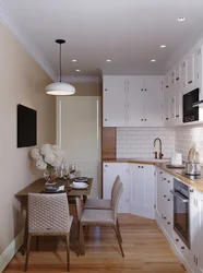 Kitchens in apartments on one wall photo