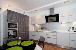 Kitchens in apartments on one wall photo