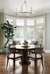 Round table for the kitchen on one leg in the interior