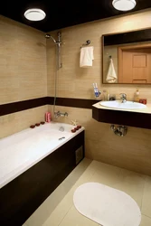 Photo of a bathroom with a dark bottom