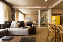 Refrigerator in the interior of the kitchen living room design