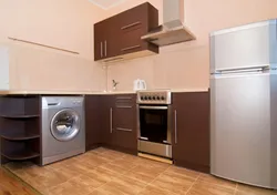 Kitchen design with refrigerator and washing machine photo