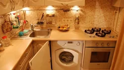 Kitchen design with refrigerator and washing machine photo