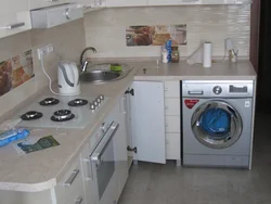 Kitchen design with refrigerator and washing machine photo