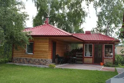 Summer kitchen with sauna and terrace under one roof photo