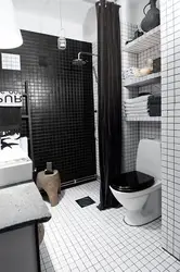 Black bathroom design with shower photo