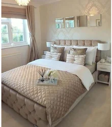 Bedroom Interior With A Soft Bed In Beige