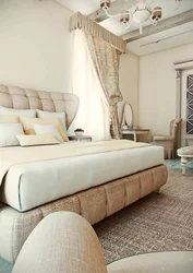 Bedroom interior with a soft bed in beige