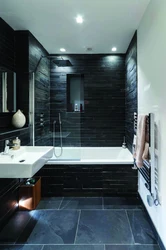 Bath with dark floor photo