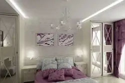 Bedroom interiors with mirrored wardrobe