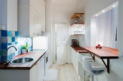 Design of a narrow kitchen with a 2 by 4 window