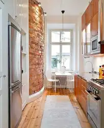 Design of a narrow kitchen with a 2 by 4 window