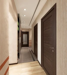 Light hallway interior with dark doors