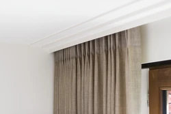Suspended ceiling photo in the living room cornices