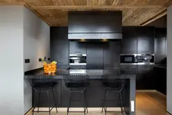 Dark wooden kitchen in the interior