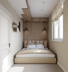 Interior of a small bedroom with one bed